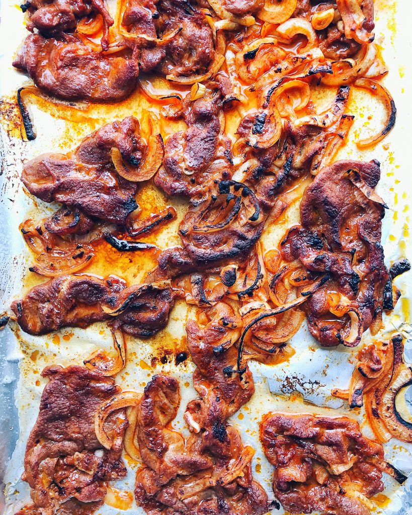 cooked Korean spicy pork on sheet pan