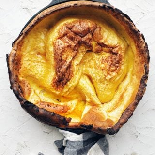 puffy dutch baby pancake in cast iron skilet