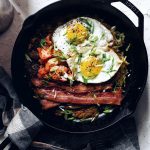 breakfast skillet with eggs, bacon, kimchi, hashbrowns