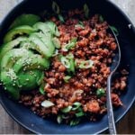korean gochujang pork rice bowl with spoon