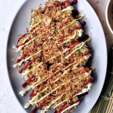 spicy tuna gimbap on oval platter