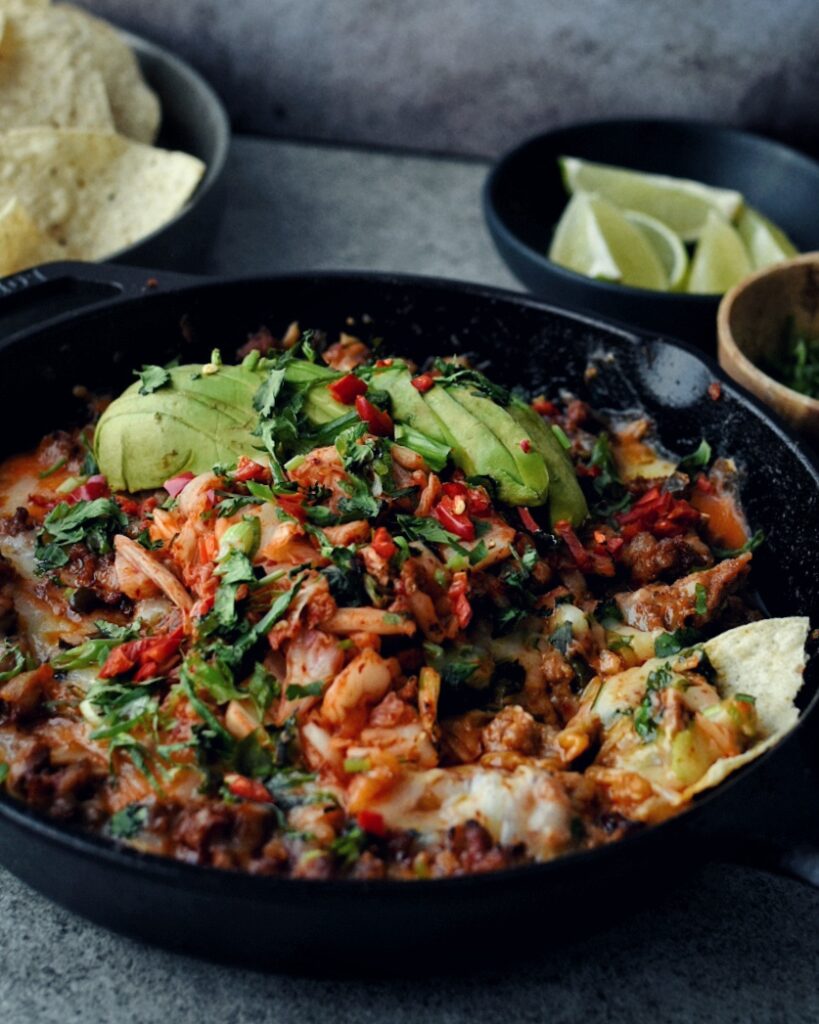kimchi queso dip in cast iron pan