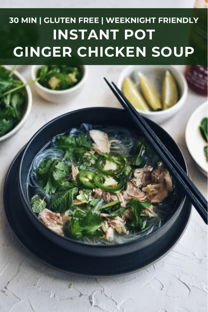 bowl of ginger chicken soup in black bowl