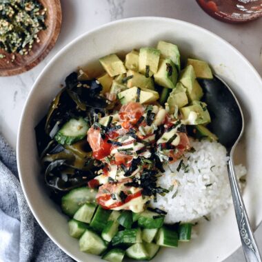 salmon poke bowl with rice and wakame