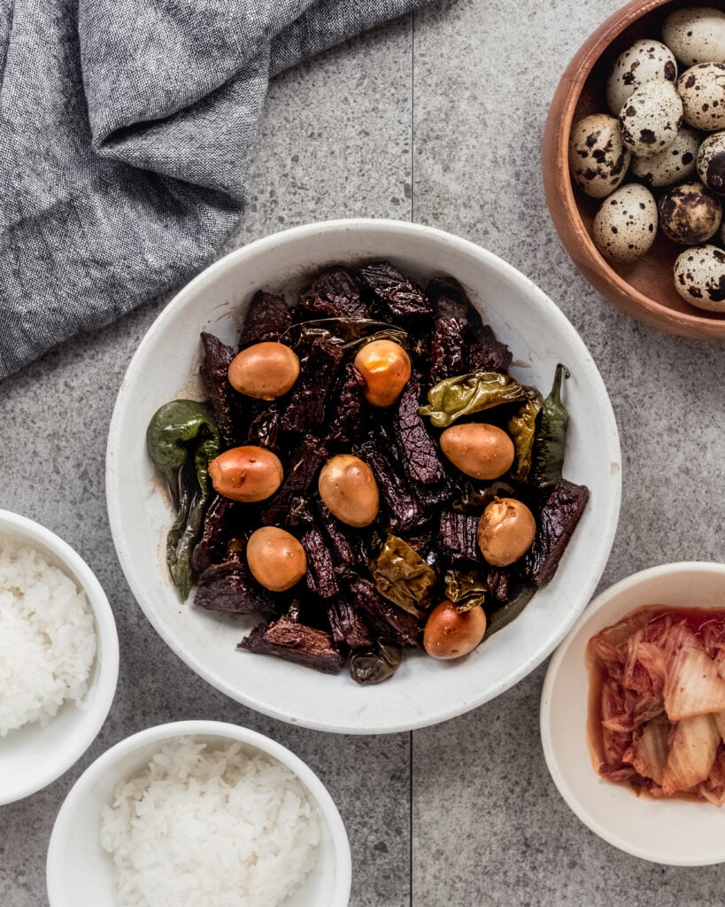 Korean Jangjorim (soy braised beef) with quail eggs in bowl
