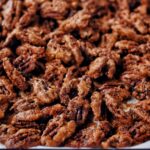 sheet pan filled with spicy candied pecans