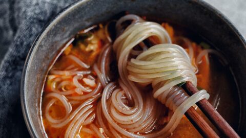 korean chicken soup (dak gomtang) with glass noodles in bowl
