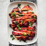 rectangular platter with sliced gochujang chicken