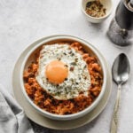 Tuna (Chamchi) Kimchi Fried rice in bowl with fried egg and spoon on the side