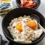 gyeran bap or korean egg rice in bowl with spoon