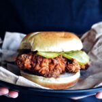 Nashville Hot Chicken Sandwich on black plate