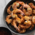 air cryer coconut shrimp in grey bowl