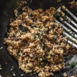wok filled with thai basil fried rice