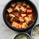 bowl filled with tuna kimchi stew (chamchi kimchi jjigae)