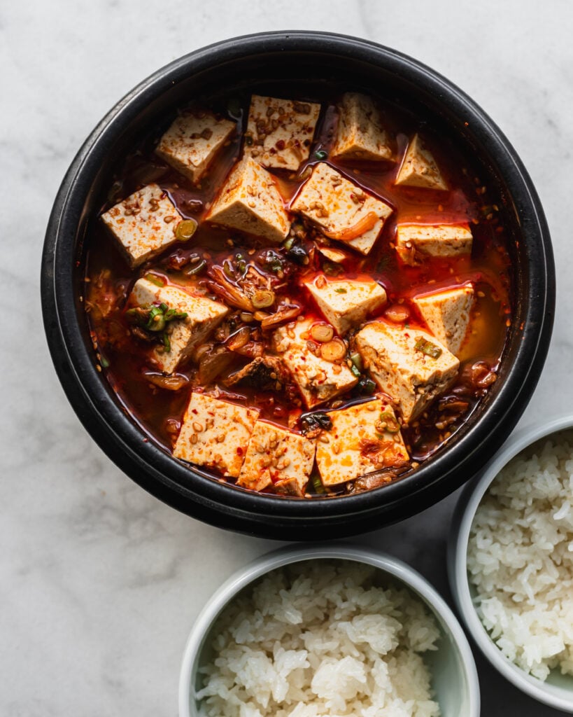 bowl filled with tuna kimchi stew (chamchi kimchi jjigae)
