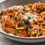 easy and creamy kimchi pasta with parmesan cheese and parsley