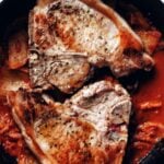 korean pork chops with kimchi pan sauce in cast iron skillet