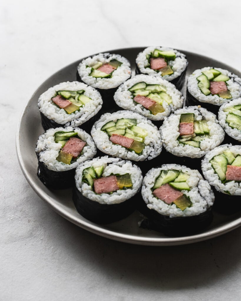 platter filled with Spam Gimbap or Korean Seaweed Rice Rolls