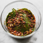 marinated korean perilla leaves (kkaennip) in glass bowl