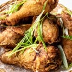 korean fried chicken drumsticks piled onto a platter