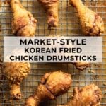 market-style korean fried chicken drumsticks on cooling rack over sheet pan
