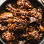 filipino chicken adobo in grey bowl