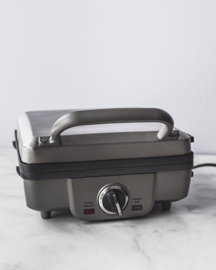 Belgian waffle maker on counter