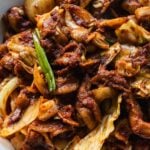 spicy korean pork (jeyuk bokkeum) in white serving platter