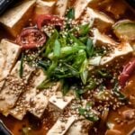 doenjang jjigae or korean soybean paste stew with text overlay: weeknight dinner ideas, 10 easy korean recipes