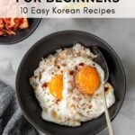 gyeran bap in bowl (korean egg rice with soy sauce and butter) with text overlay: korean food for beginners, 10 easy korean recipes