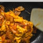 kimchi scrambled eggs in pan