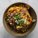 kimchi scrambled egg rice bowl with green onion and text overlay