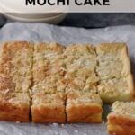 squares of coconut mochi cake on parchment paper